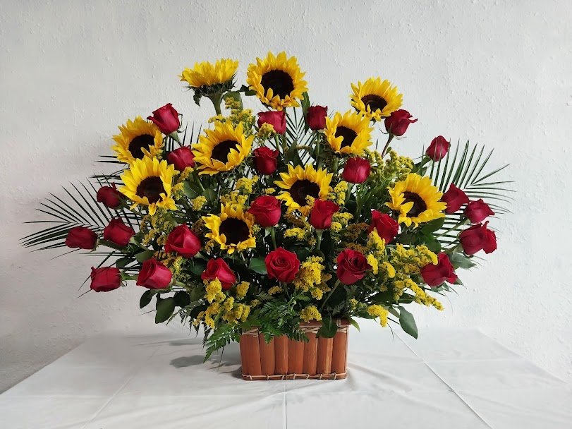 Bright sunshine & love, 24 roses and 10 sunflowers in a basket.