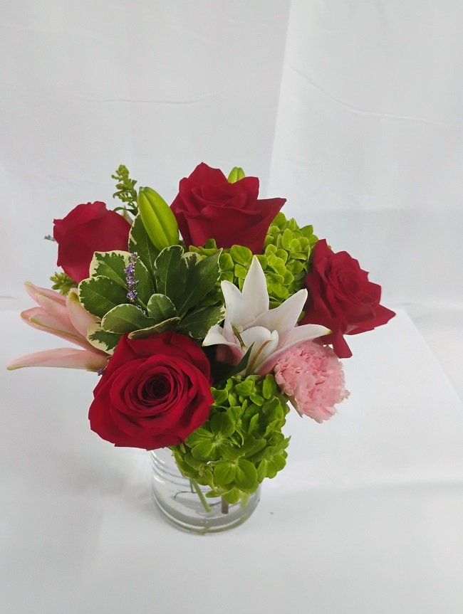 Romantic Expression, roses, lilies and hydrangeas.