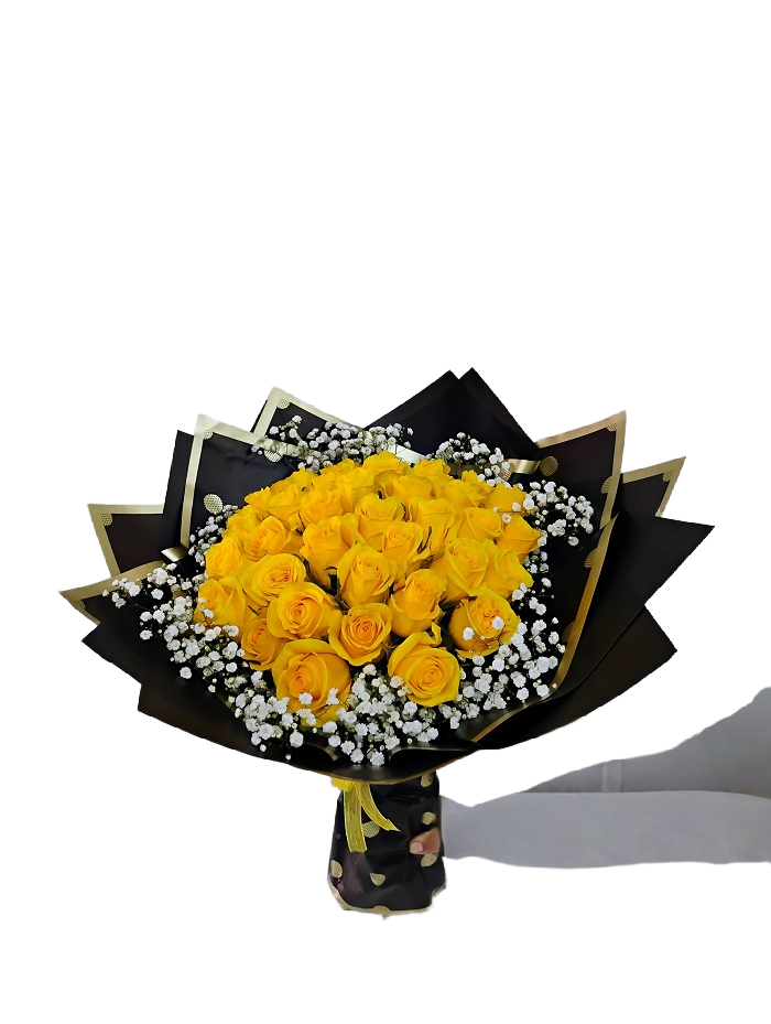 36 yellow roses, wrapped with paper.