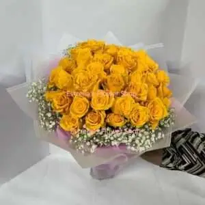 50 Yellow roses wrapped.