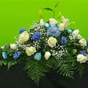 White and blue casket cover