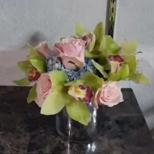 Exotic Orchids and roses. Color according to availab