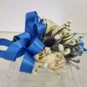 White and blue corsage
