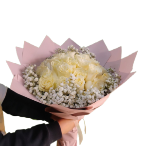 24 white roses wrapped. 24 elegant and beautiful roses wrapped with paper.