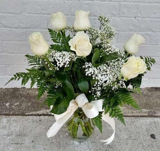 7 White roses.